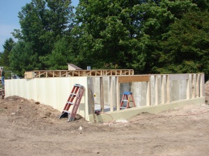 Half wall finished and joists being spread across.